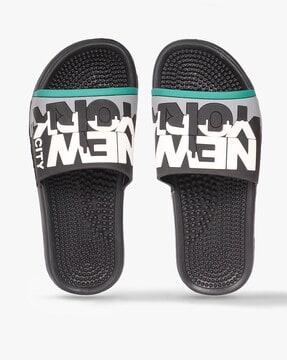 typographic embossed slip-on slides