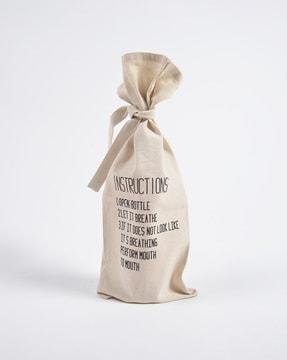 typographic print drawstring canvas wine bag