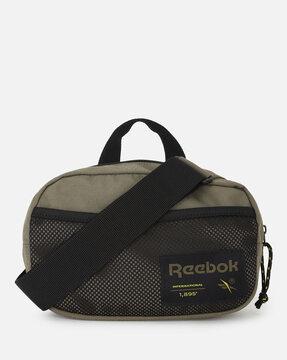 typographic print duffle bag with adjustable strap