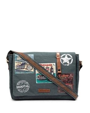 typographic print messenger bag with adjustable strap