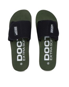 typographic print slides with velcro fastening