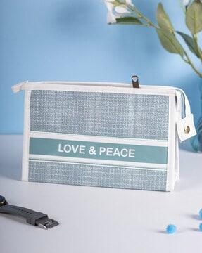 typographic print travel pouch with zip closure