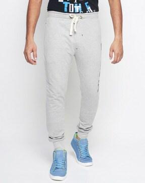 typography print joggers with drawstring fastening