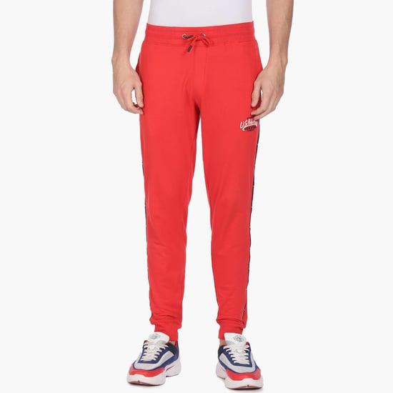 u.s. polo assn. men solid mid rise drawstring waist trackpants