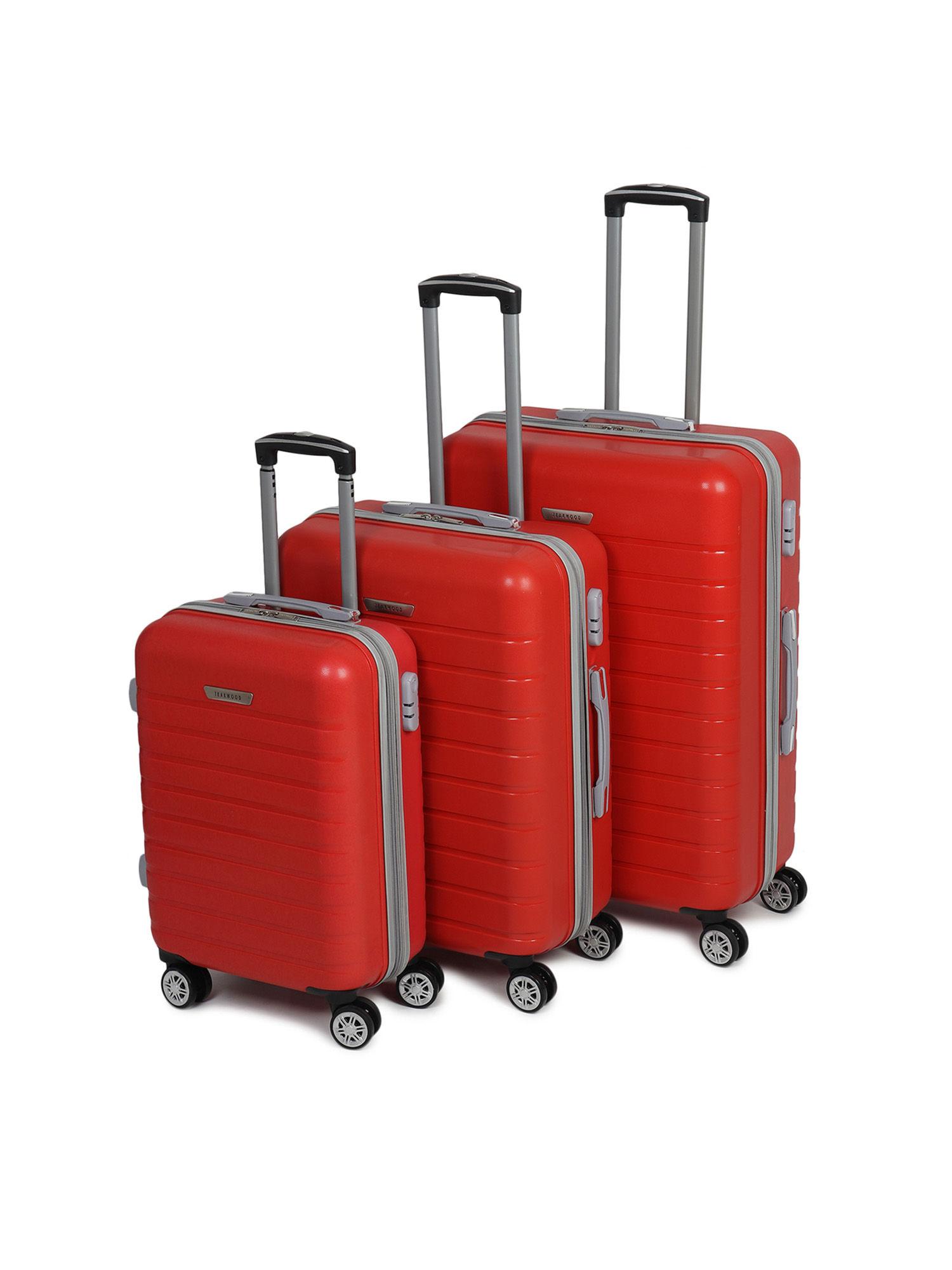 unisex red textured hard sided cabin size trolley bag