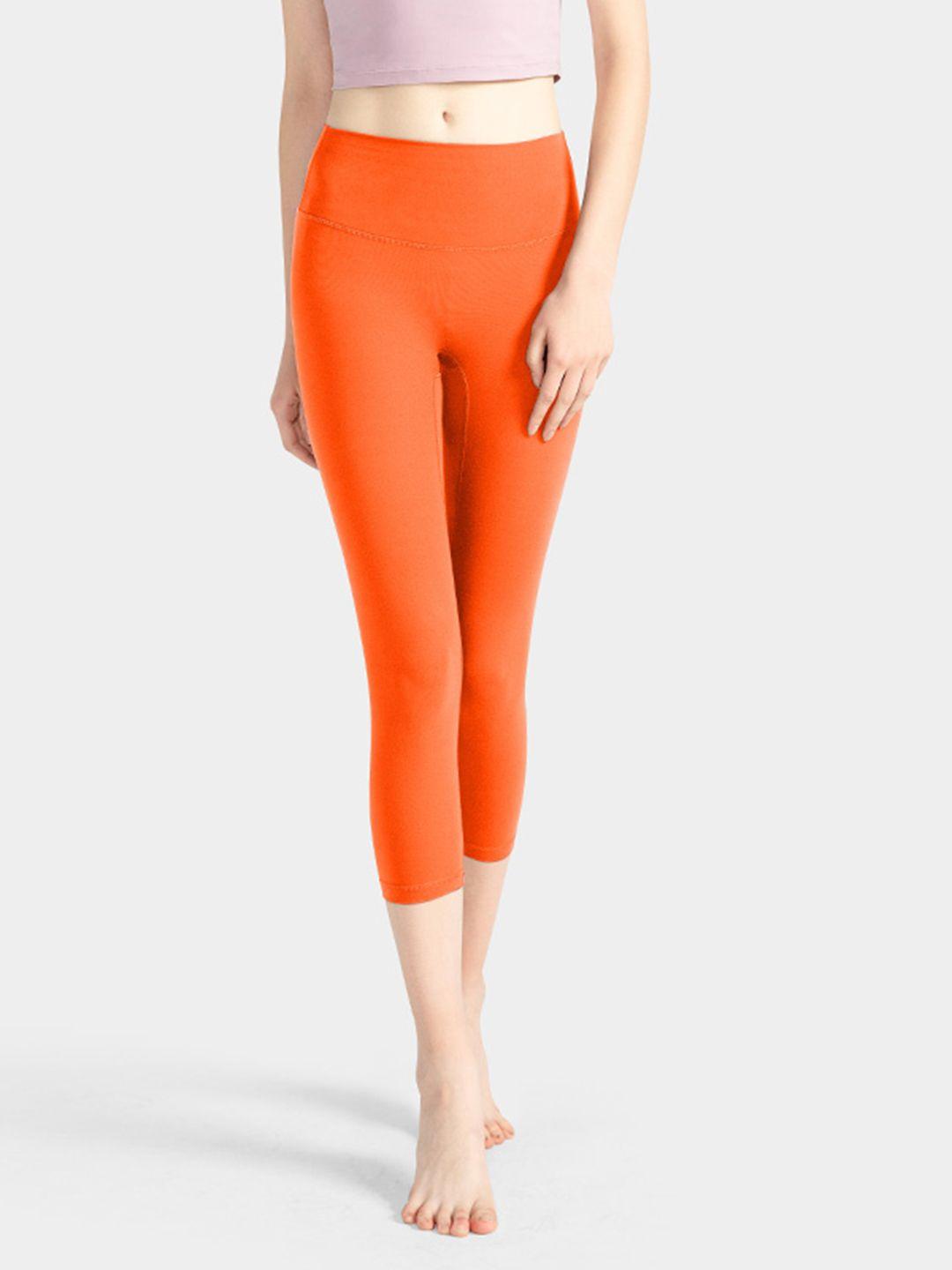 urbanic women orange solid gym tights
