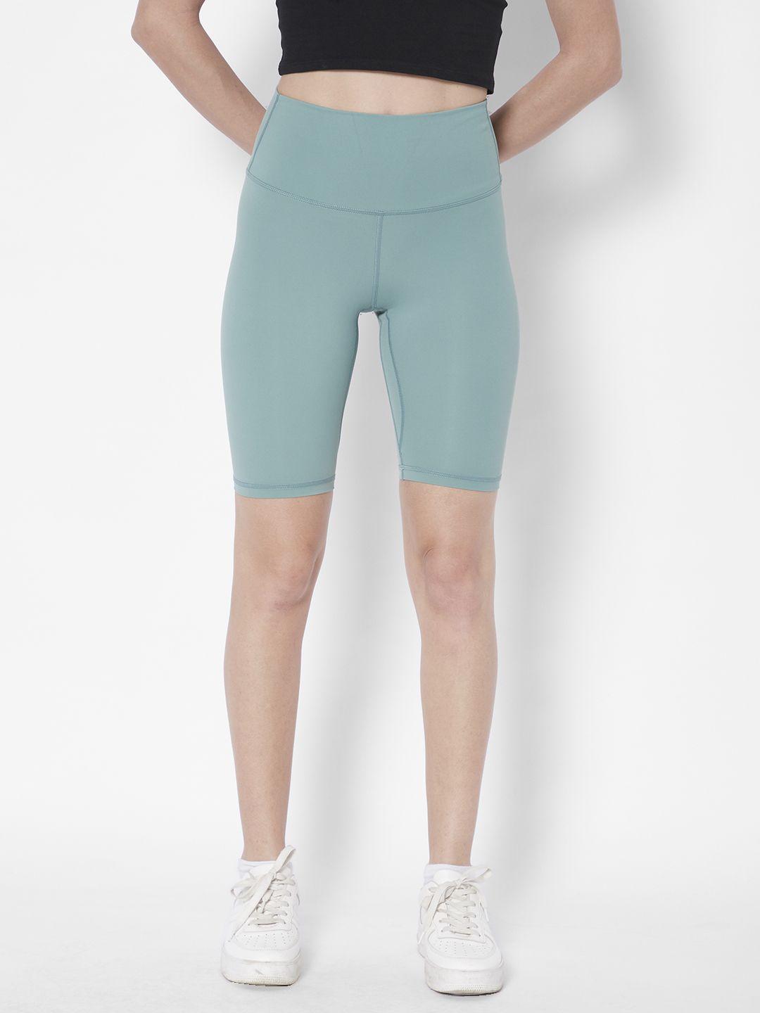 urbanic women sea green solid slim fit high-rise gym biker shorts