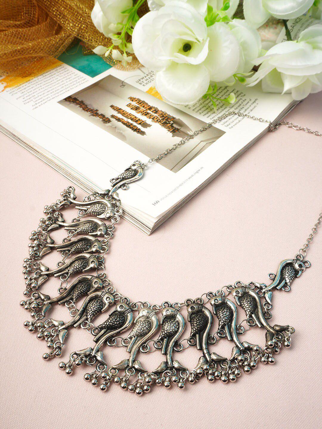 urmika silver-toned oxidised dolphin necklace