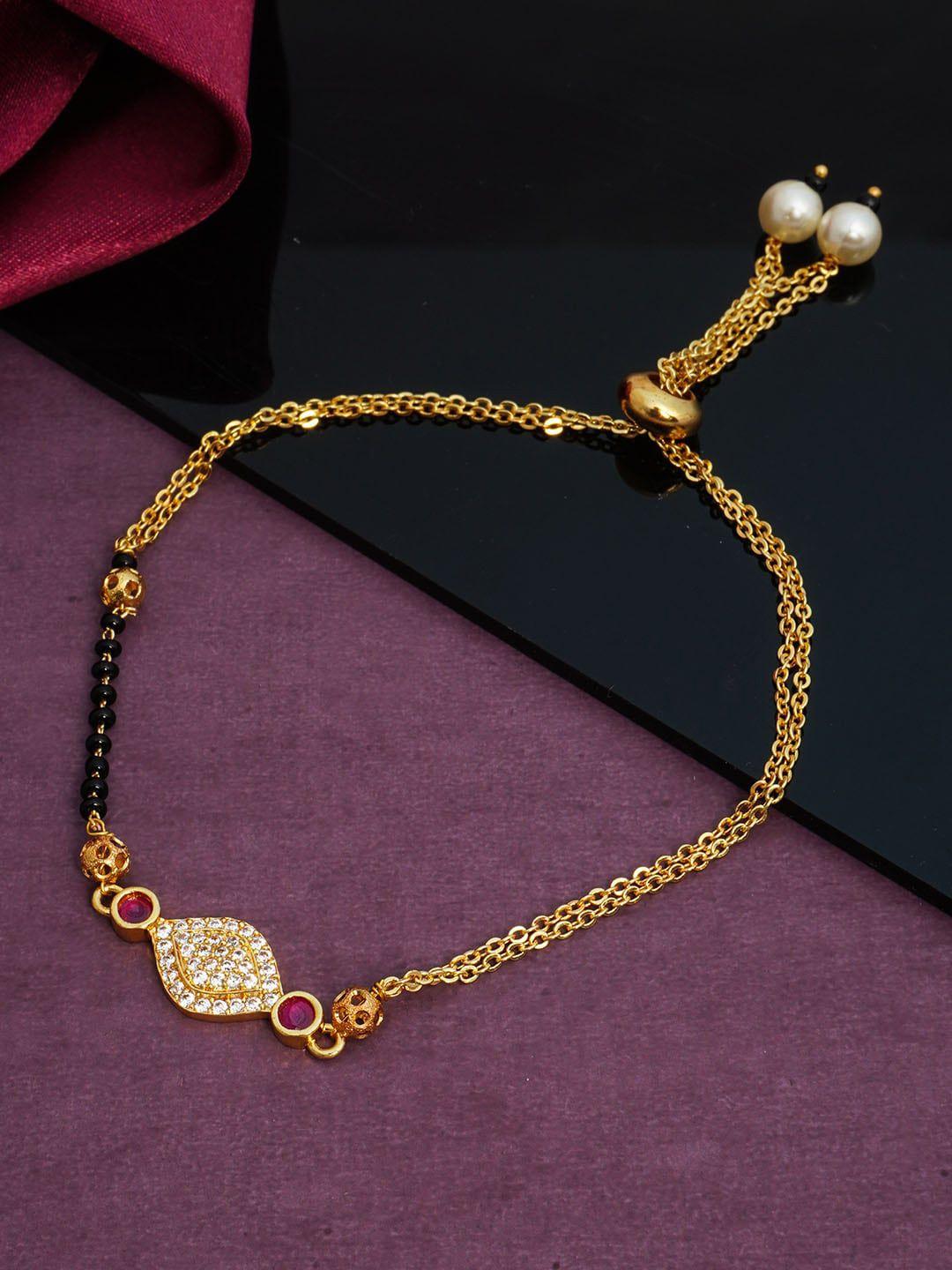 urmika women gold-toned & black charm bracelet