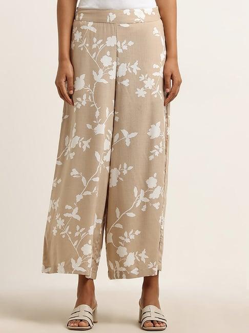 utsa by westside beige leaf printed mid rise palazzos