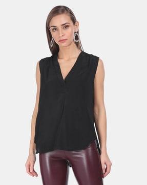 v-neck sleeveless top with curved hemline