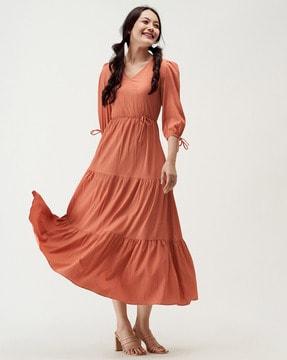 v-neck tiered dress with puff sleeves