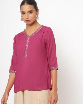 v-neck top with embroidered neckline