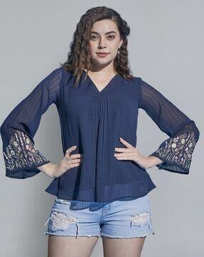 v-neck top with embroidered sleeves