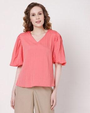 v-neck top with flared sleeves