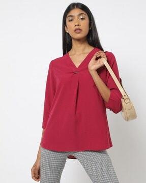 v-neck top with metal accent