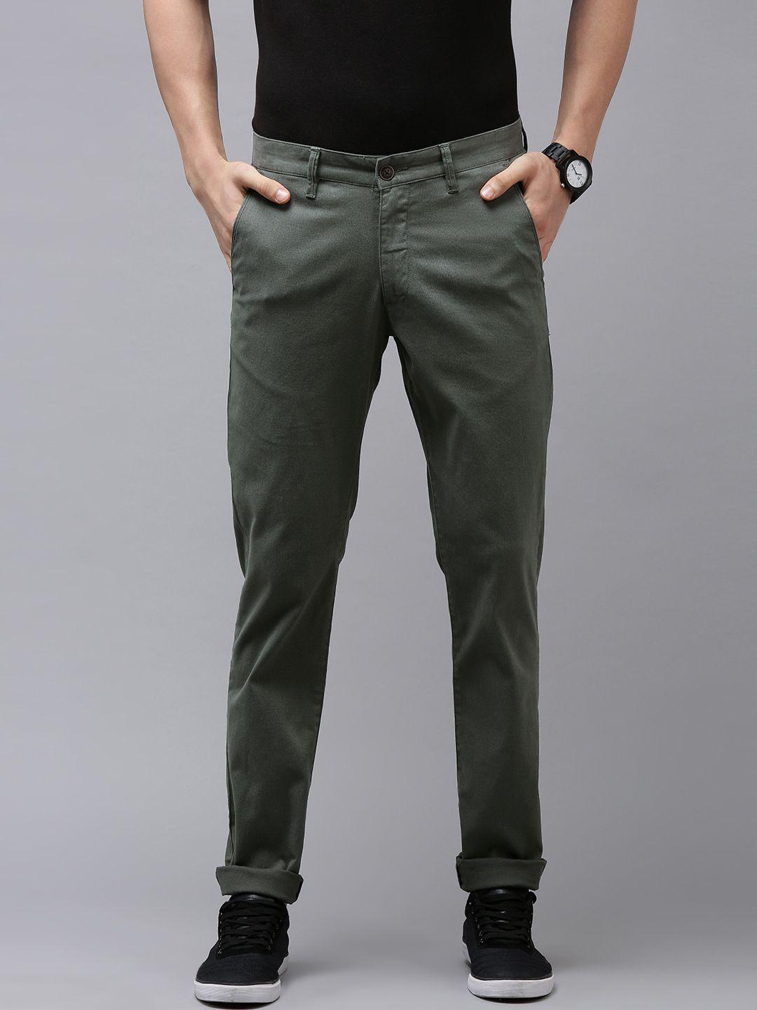 van heusen sport men olive green self design textured tapered fit mid-rise plain trousers