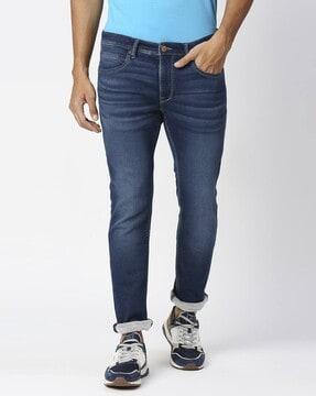 vapour mid-wash tapered fit jeans