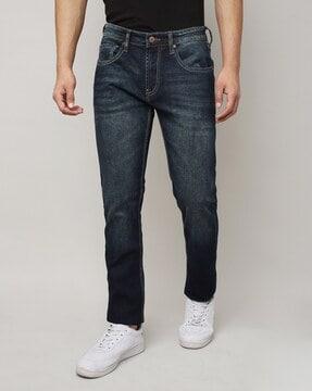 vapour slim fit mid-wash jeans