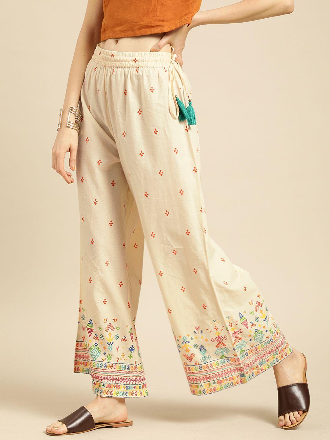 varanga women cream-coloured printed straight palazzos