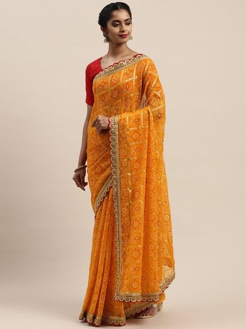 vastranand mustard printed saree with unstitched blouse