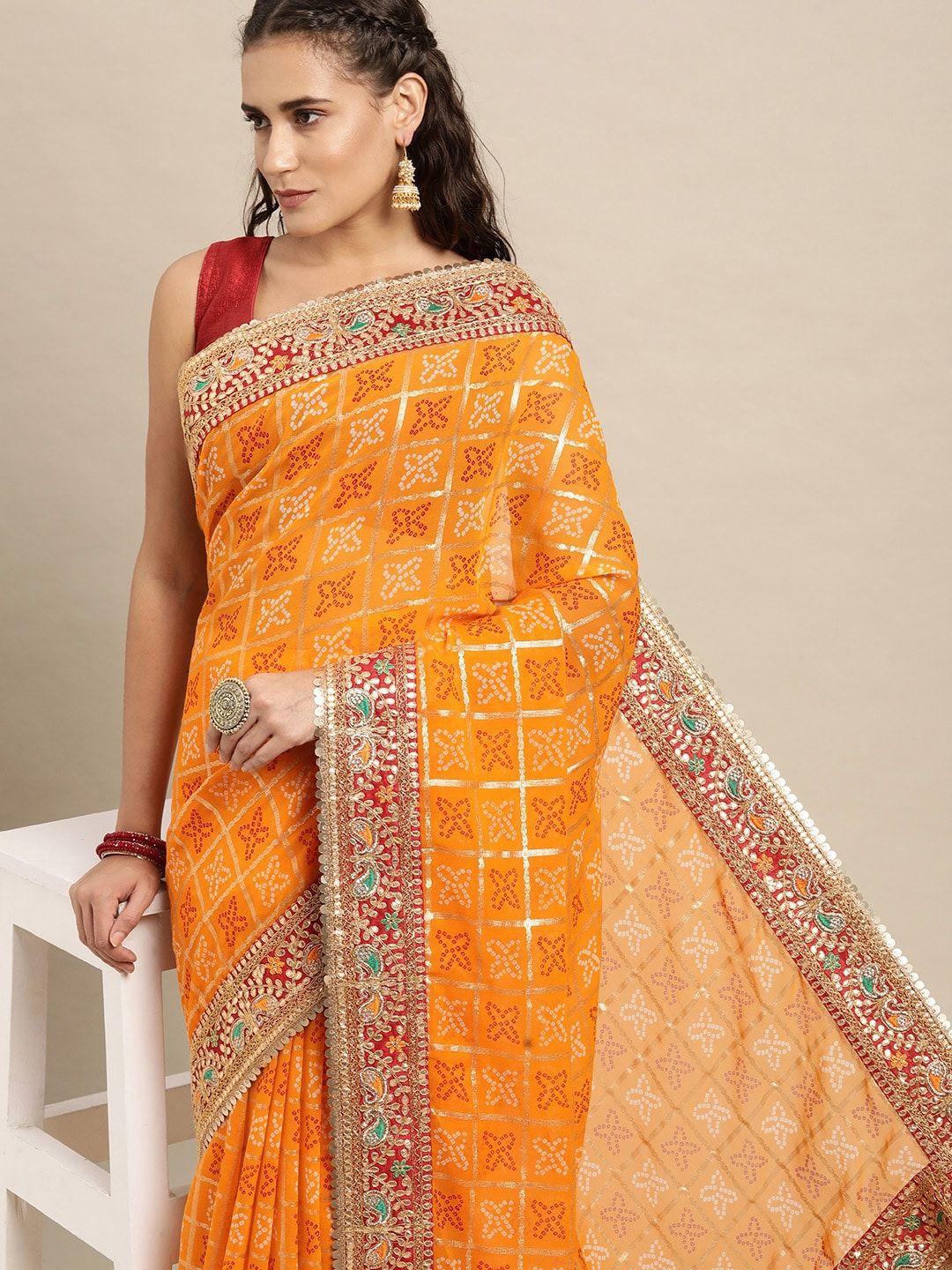 vastranand yellow & red sequinned bandhani saree