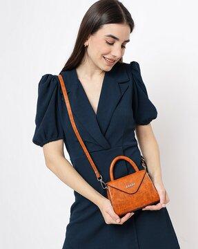 vegan mini top handle sling bag