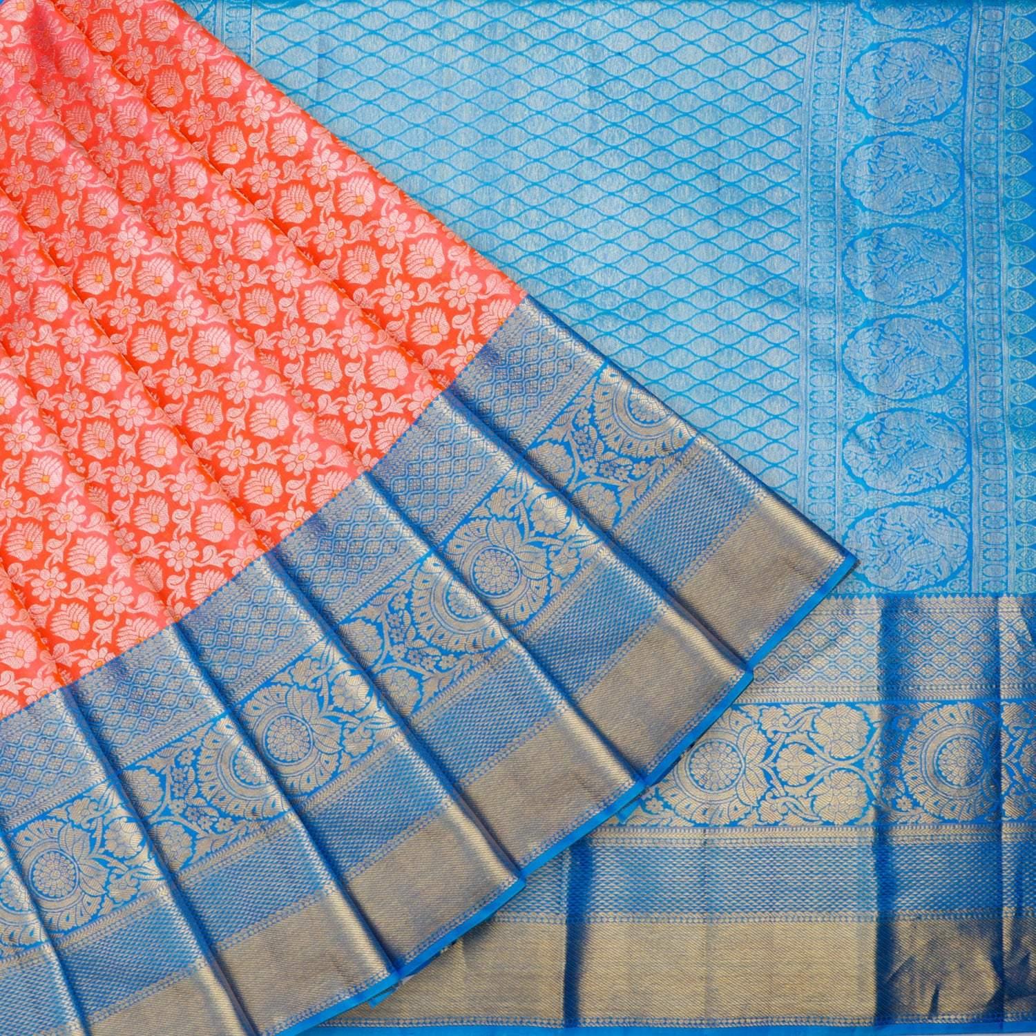 vibrant orange kanjivaram silk saree with floral pattern