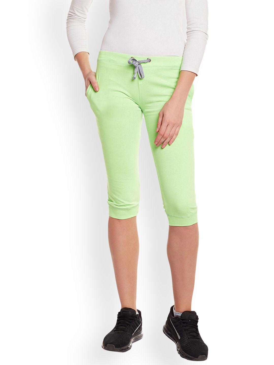 vimal jonney women fluorescent green solid slim fit capris