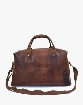 vintage voyageur leather duffle bag