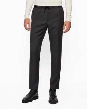 virgin wool slim fit pleated trousers with drawstring waist