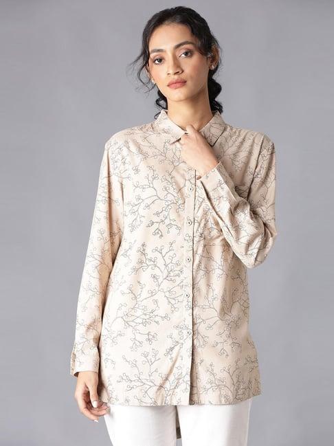 w beige floral print shirt