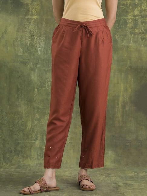 w red solid straight pants with two pockets and drawstring