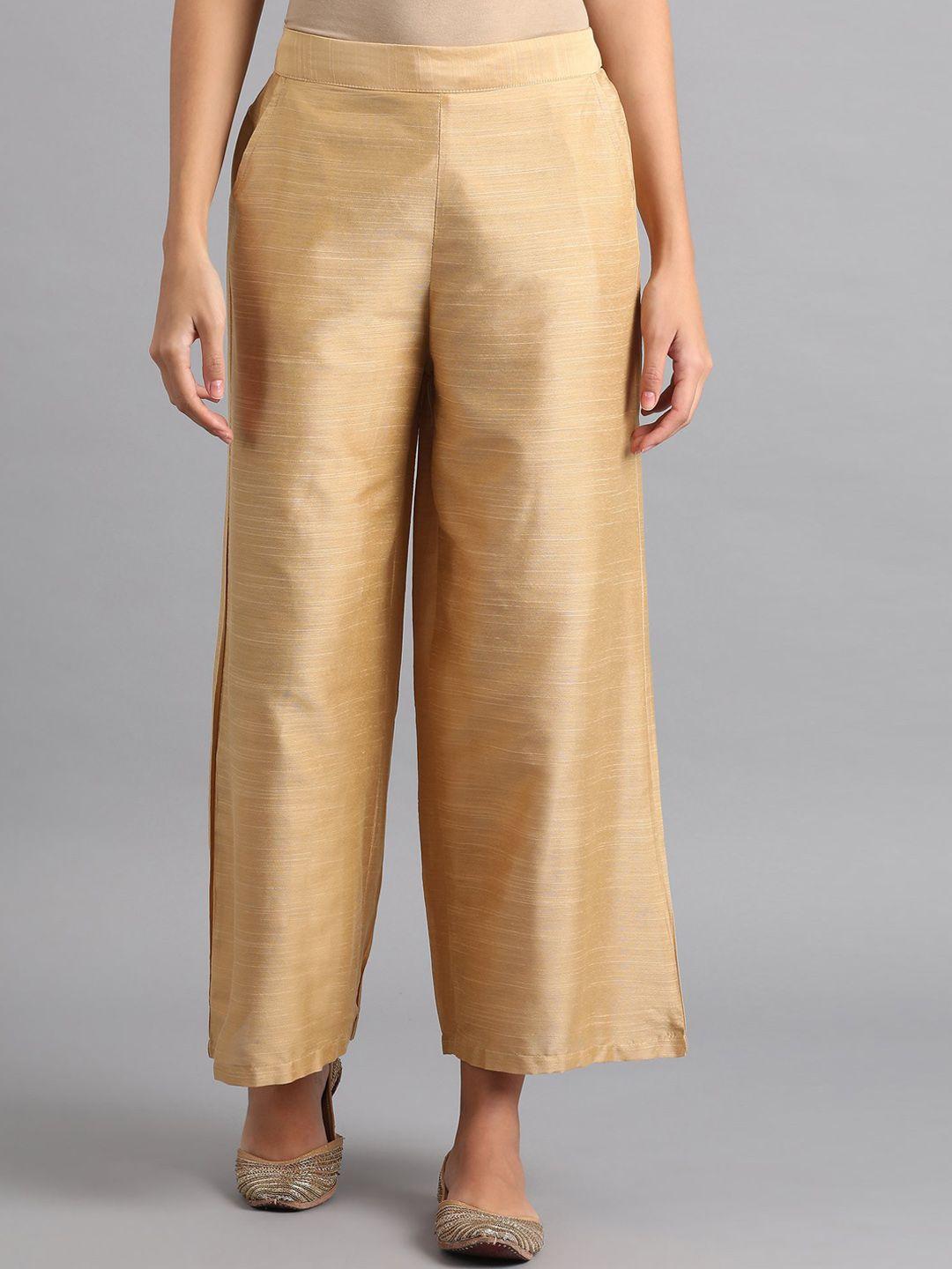 w women gold-toned loose fit ethnic trousers