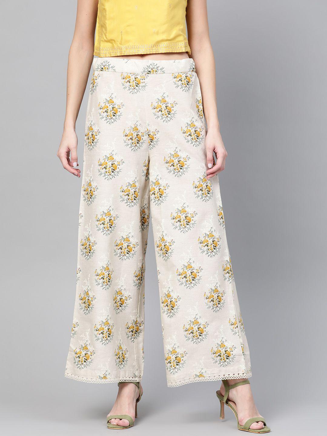 w women off-white & mustard yellow floral printed flared palazzos