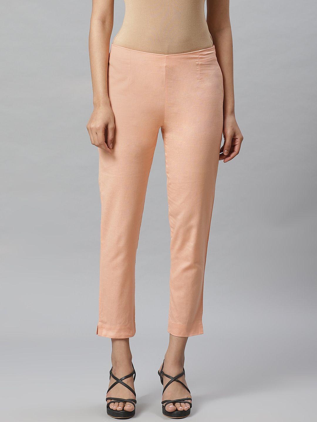 w women peach-coloured slim fit solid cropped regular trousers