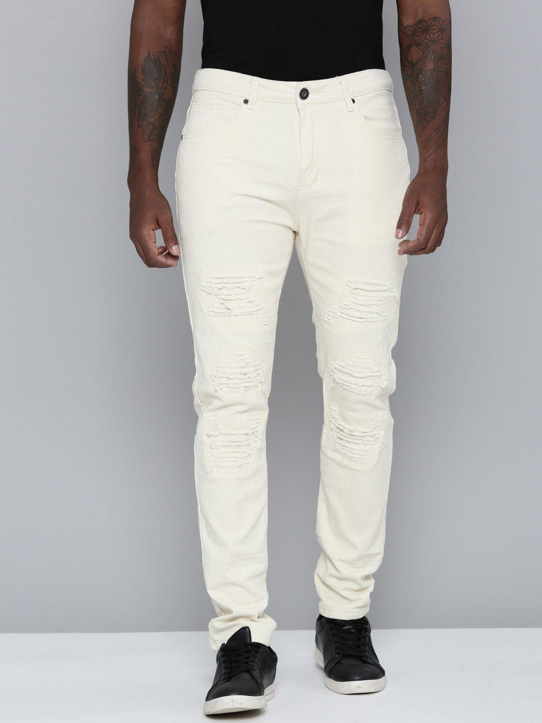 waimea men cream-coloured highly distressed stretchable jeans
