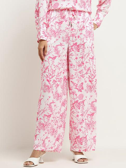 wardrobe by westside pink foliage pattern flared mid-rise trousers