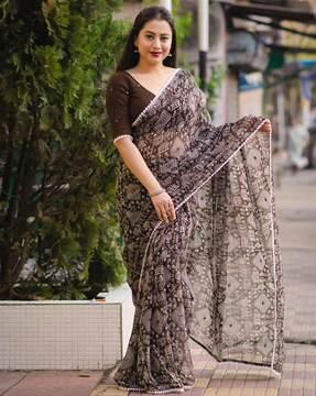 warli print saree with lace border