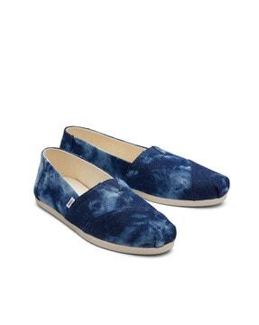 washed canvas navy slip-ons