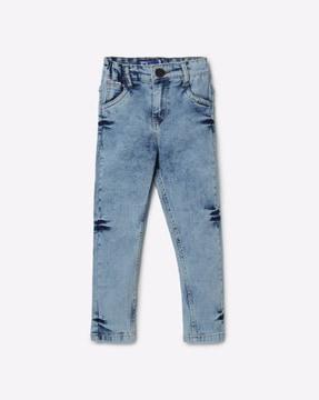 washed jeans with button closure