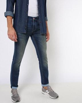 washed slim fit jeans with whiskers