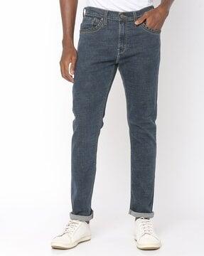 washed slim fit tapered jeans