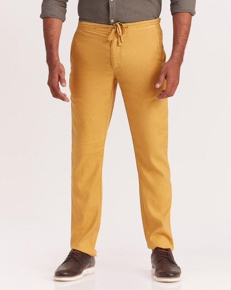 washed tapered fit flat-front pants