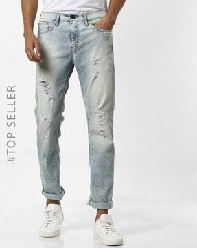 washed & distressed skinny jeans