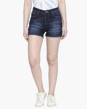 washed denim shorts with frayed hems