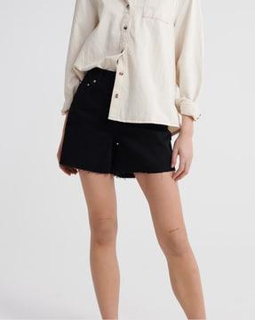 washed denim shorts with frayed hems