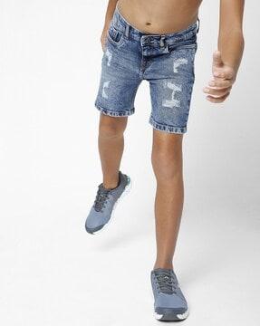 washed distressed denim shorts