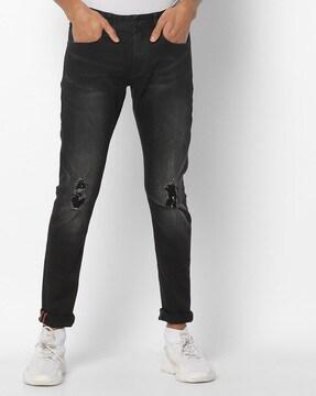 washed distressed skinny fit jeans