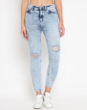 washed distressed skinny jeans